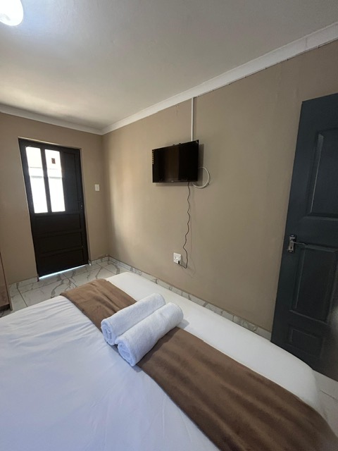 Room with wall-mounted TV